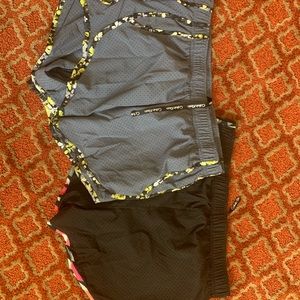 TWO pairs of Calvin Klein mesh workout shorts